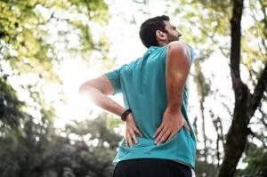 Male runner with back pain