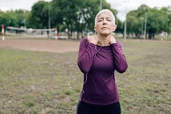 Woman runner with neck pain