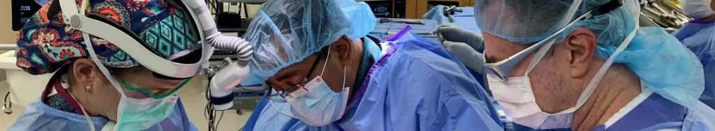 Spine Surgeons conducting surgery for a Lumbar Herniated Disc