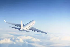 Commercial jet flying to Southwest Scoliosis and Spine Institute